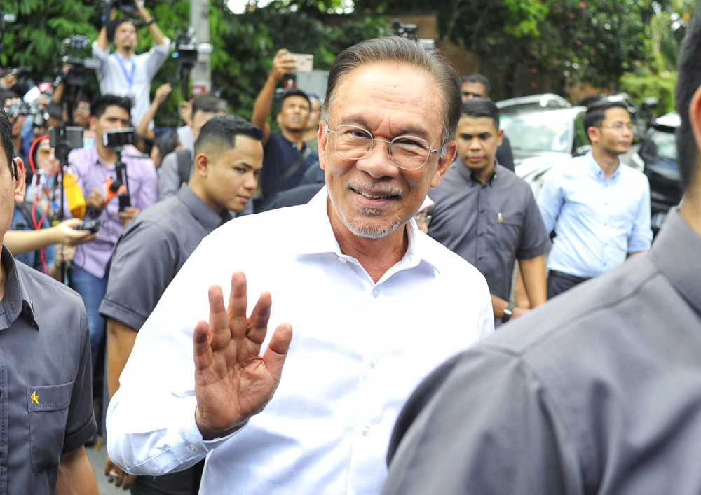 Datuk Seri Anwar Ibrahim speaks to reporters gathered outside his residence in Kuala Lumpur February 26, 2020. u00e2u20acu201d Picture by Shafwan Zaidon