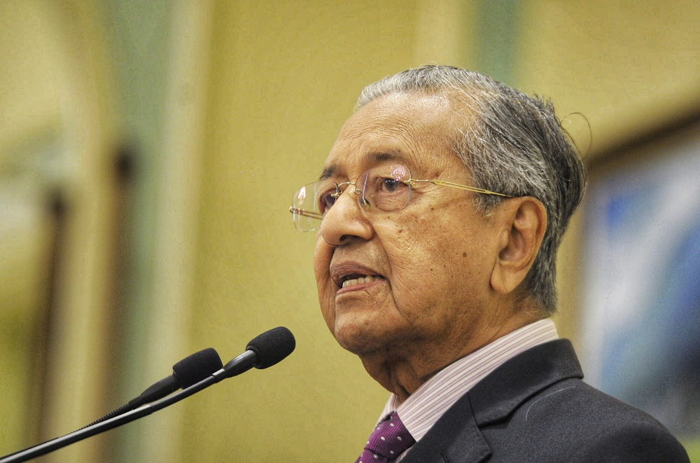 Interim Prime Minister Tun Mahathir Mohamad speaks during the economic stimulus package announcement at Perdana Putra building in Putrajaya February 27, 2020. u00e2u20acu201d Picture by Shafwan Zaidon