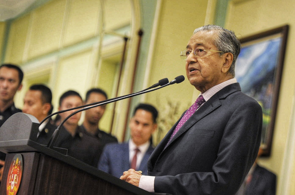 Interim Prime Minister Tun Mahathir Mohamad speaks during the economic stimulus package announcement at Perdana Putra building in Putrajaya February 27, 2020. u00e2u20acu201d Picture by Shafwan Zaidon
