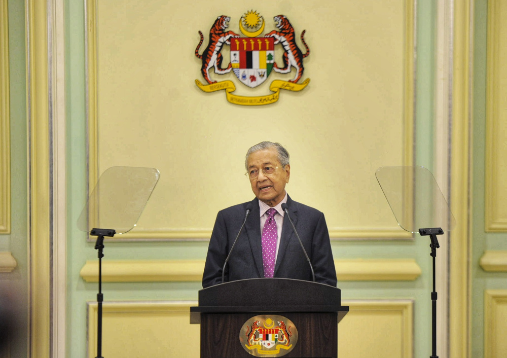 Interim Prime Minister Tun Mahathir Mohamad speaks during the economic stimulus package announcement at Perdana Putra building in Putrajaya February 27, 2020. u00e2u20acu201d Picture by Shafwan Zaidon