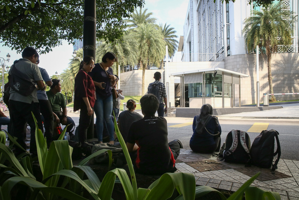 Members of the media wait outside the Yayasan Al-Bukhary in Kuala Lumpur February 29, 2020. u00e2u20acu201d Picture by Yusof Mat Isa