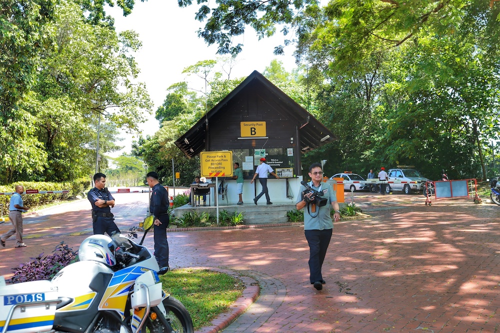 Members of media gather outside Gate B of Tun Mahathir's housing area in Seri Kembangan February 24, 2020. u00e2u20acu201d Picture by Ahmad Zamzahuri