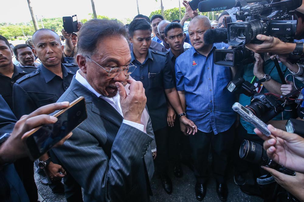 PKR President Datuk Seri Anwar Ibrahim arrives at the PKR headquarters in Petaling Jaya, February 23, 2020. u00e2u20acu201d Picture by Hari Anggara