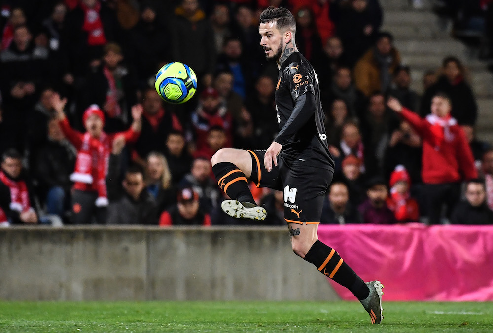 Marseilleu00e2u20acu2122s Argentine forward Dario Benedetto kicks the ball and scores a goal against Nimes Olympique at the Costieres stadium in Nimes, southern France February 28, 2020. u00e2u20acu201d AFP pic