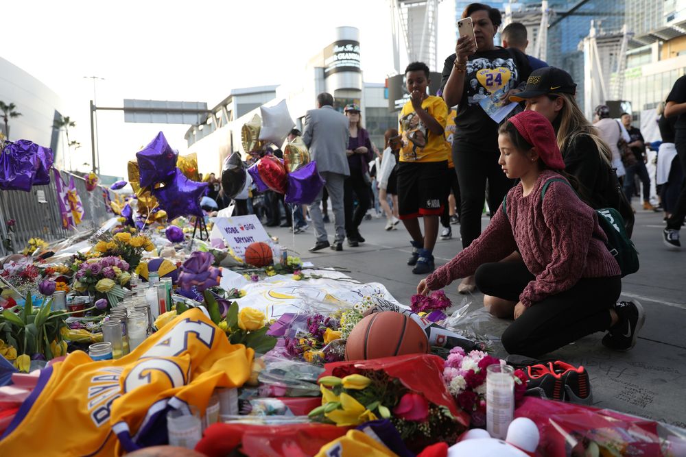 Mourners gather outside Staples Center before a Los Angeles Lakers home game to pay respects to Kobe Bryant after a helicopter crash killed the retired basketball star and his daughter Gianna, in Los Angeles, California, January 31, 2020. u00e2u20acu201d Reuters pic