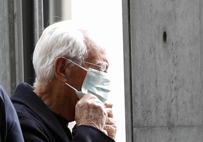 Designer Giorgio Armani puts on a face mask as he arrives at the venue of his Autumn/Winter 2020 collection fashion show during Milan Fashion Week in Milan February 23, 2020. u00e2u20acu2022 Reuters pic
