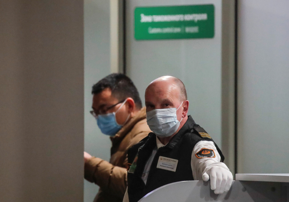 A member of Sheremetyevo International Airportu00e2u20acu2122s security service wears a protective mask outside Moscow, Russia February 4, 2020. u00e2u20acu201d Reuters pic 