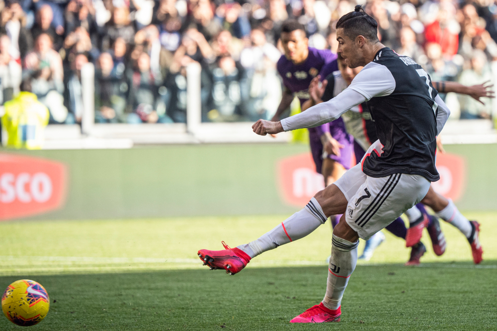Juventusu00e2u20acu2122 Portuguese forward Cristiano Ronaldo shoots to score his second penalty, and his 50th goal with Juventus, during the Italian Serie A football match Juventus vs Fiorentina February 2, 2020 at the Juventus Allianz stadium in Turin. u00e2u20acu201d AFP pic 