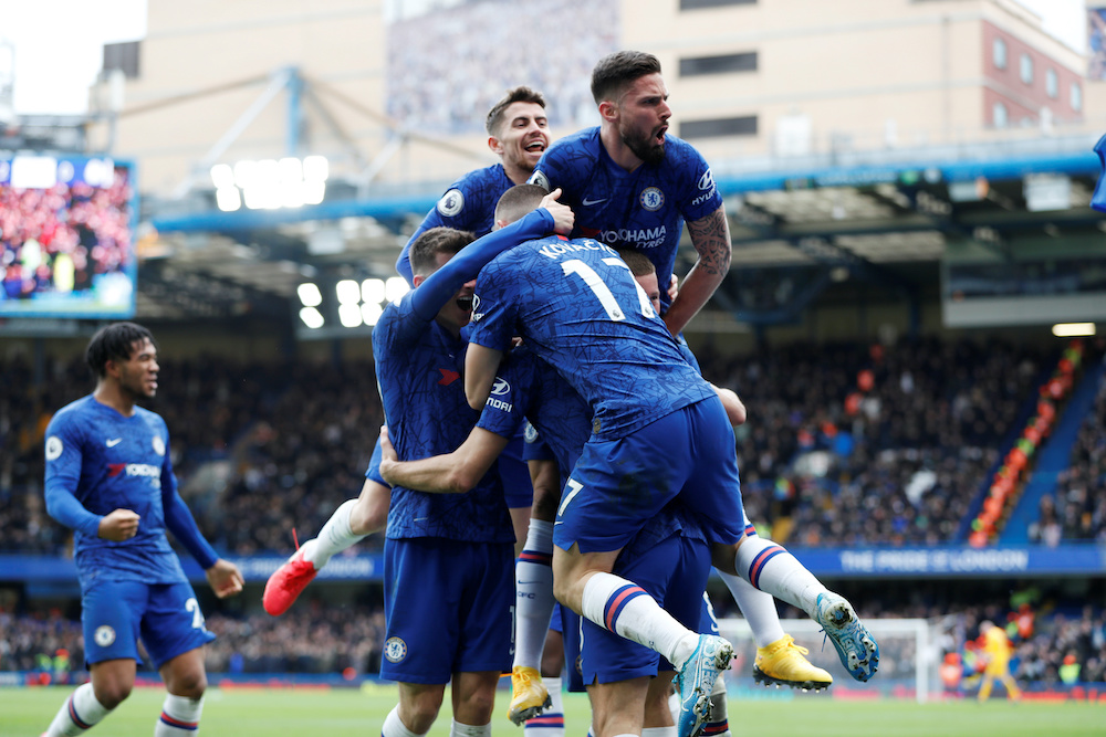 Chelseau00e2u20acu2122s Marcos Alonso celebrates scoring their second goal with Olivier Giroud and teammates during their match with Tottenham Hotspur at the Stamford Bridge stadium in London, February 22, 2020. u00e2u20acu201d Reuters pic
