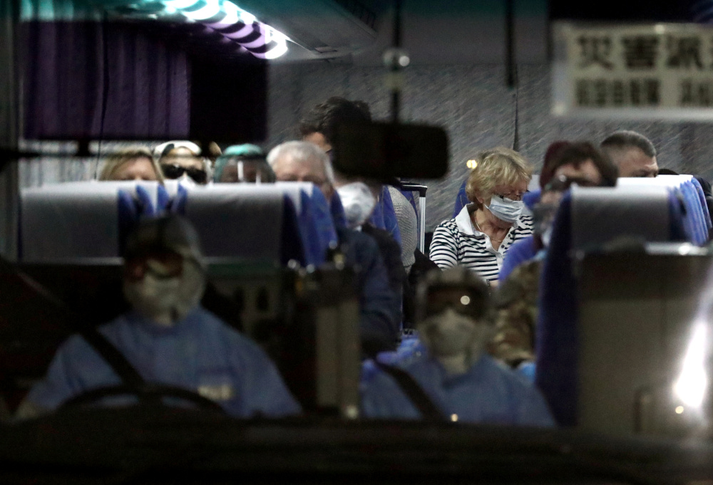Passengers are seen inside a bus as they leave the coronavirus-hit cruise ship u00e2u20acu02dcDiamond Princessu00e2u20acu2122 at Daikoku Pier Cruise Terminal in Yokohama, south of Tokyo, Japan February 21, 2020. u00e2u20acu201d Reuters pic 