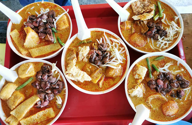 Many old customers tell the the stall owner Lim Boon Swee that the curry mee is like the curry mee served long ago