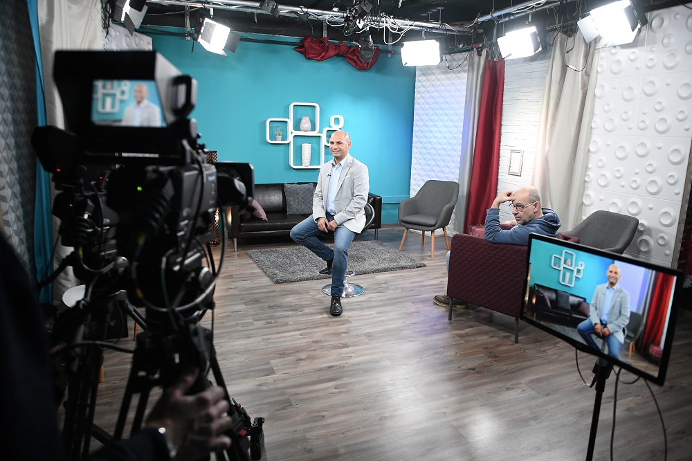 An anchorman (centre) of the new country-wide television channel Dikh TV, the first Hungarian Gypsy TV network, is pictured during a recording session in their studio in Budapest, Hungary December 4, 2019. u00e2u20acu201d AFP pic 
