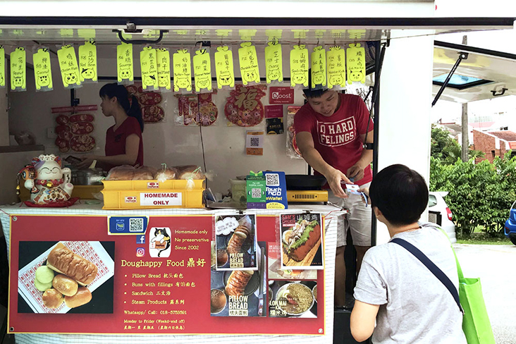 Regular customers flock to the DougHappy truck.