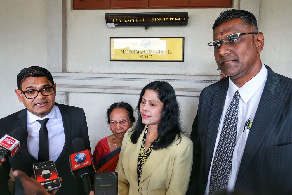 E. Meeriam Rosalineu00e2u20acu2122s lawyers Ramesh Sivakumar (left)  and RSN Rayer (right) speak to members of the media at the Kuala Lumpur High Court February 18, 2020. u00e2u20acu201d Picture by Ahmad Zamzahuri