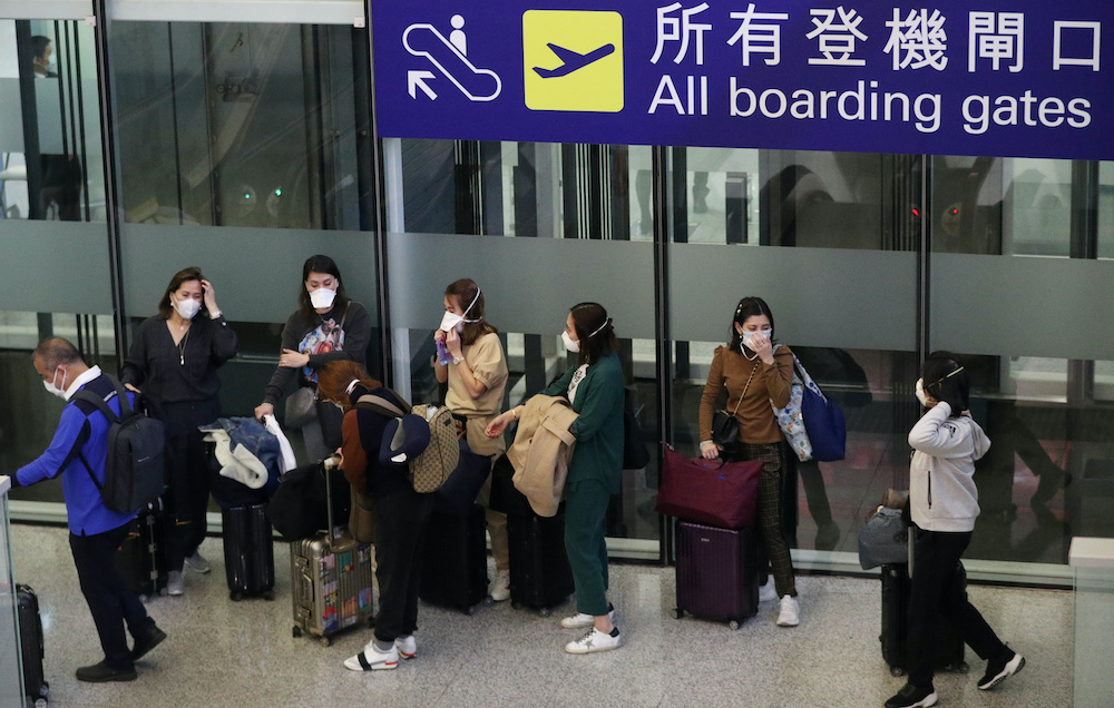 Passengers wear protective masks as they wait at Hong Kong International Airport, following the coronavirus outbreak in Hong Kong, China, February 7, 2020. u00e2u20acu201d Reuters pic 