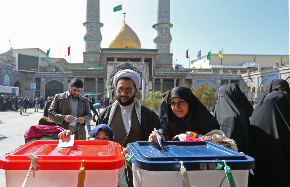 Iranians cast their votes during parliamentary elections at the Shah Abdul Azim shrine on the southern outskirts of Tehran February 21, 2020. u00e2u20acu201d AFP pic 