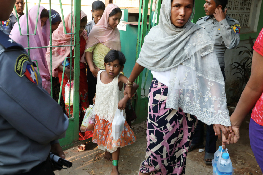 Arrested Rohingya people leave a Hlegu court, outside Yangon, Myanmar, February 21, 2020. u00e2u20acu201d Reuters pic