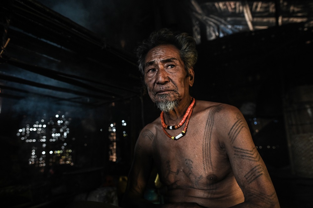 This photo taken on February 6, 2020 shows Ngon Pok, 80, a tattooed Lainong tribesman, at his house at Lahel township in Sagaing region of Myanmar, wedged in a semi-autonomous zone near the Indian border. u00e2u20acu2022 AFP pic  