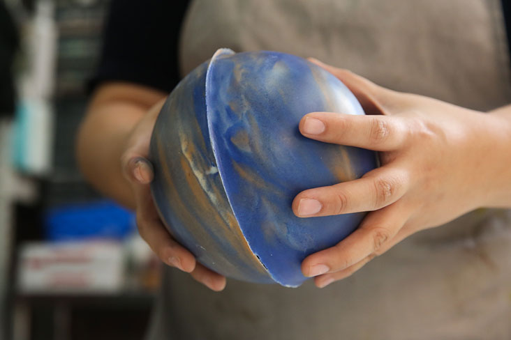 The planet is made from two pieces of chocolate shells