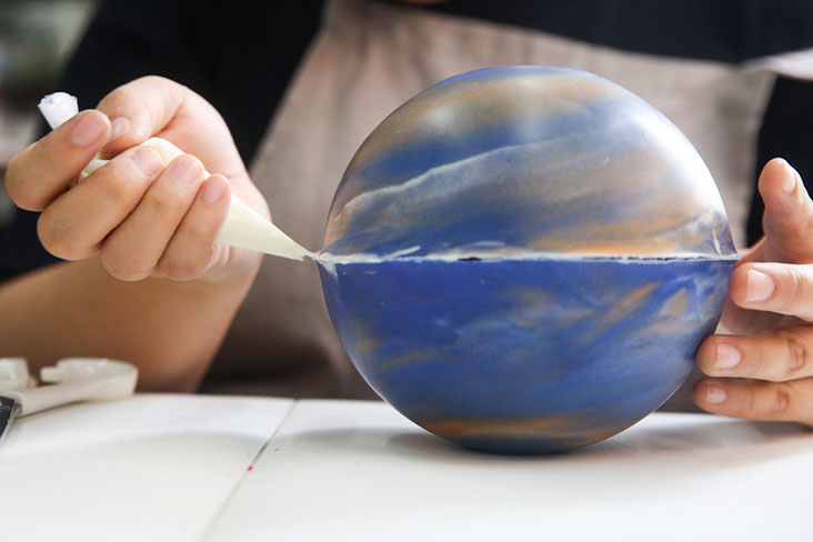 It's tricky working with chocolate in our hot and humid weather so you need to be very delicate in sealing the two shells with melted chocolate