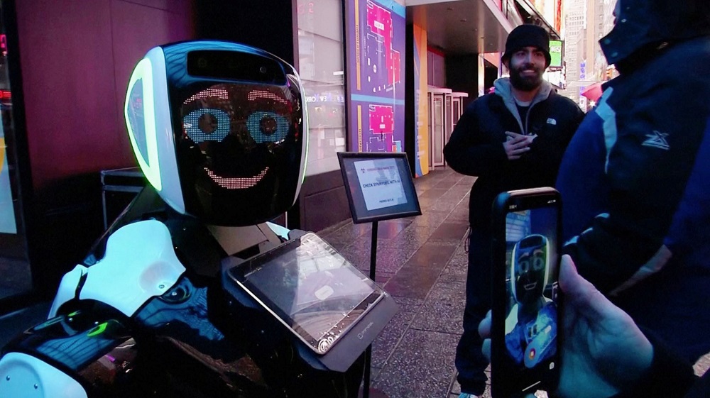 Passers-by in Times Square interact with a Promobot robot that informs the public about the symptoms of coronavirus and how to prevent it from spreading, in this still frame obtained from video, in New York February 10, 2020. u00e2u20acu201d Reuters pic