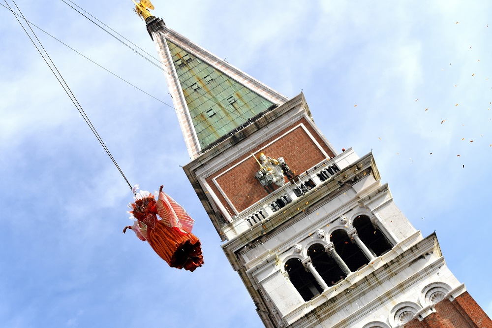 The u00e2u20acu02dcangelu00e2u20acu2122 Linda Pani performs as the Angel of the new Carnival on February 16, 2020 by the Bell Tower on St Marku00e2u20acu2122s Square in Venice. u00e2u20acu201d AFP pic