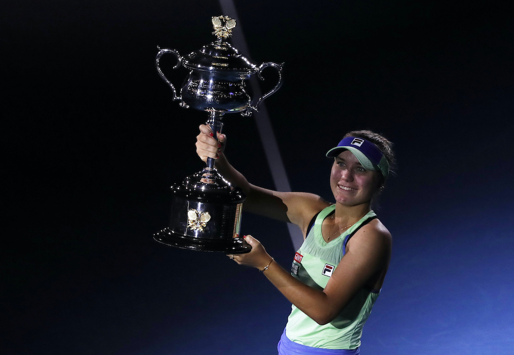 Sofia Kenin of the US celebrates with the trophy after winning her match against Spainu00e2u20acu2122s Garbine Muguruza at the Australian Open Womenu00e2u20acu2122s Singles Final at Melbourne Park in Melbourne, February 1, 2020. u00e2u20acu201d Reuters picnnn