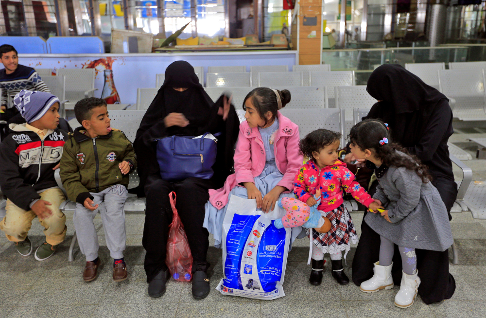 Yemeni children wait with their guardians at Sanaa International Airport February 3, 2020, for evacuation aboard a UN aircraft bound for the Jordanian capital Amman to receive medical treatment there. u00e2u20acu201d AFP pic
