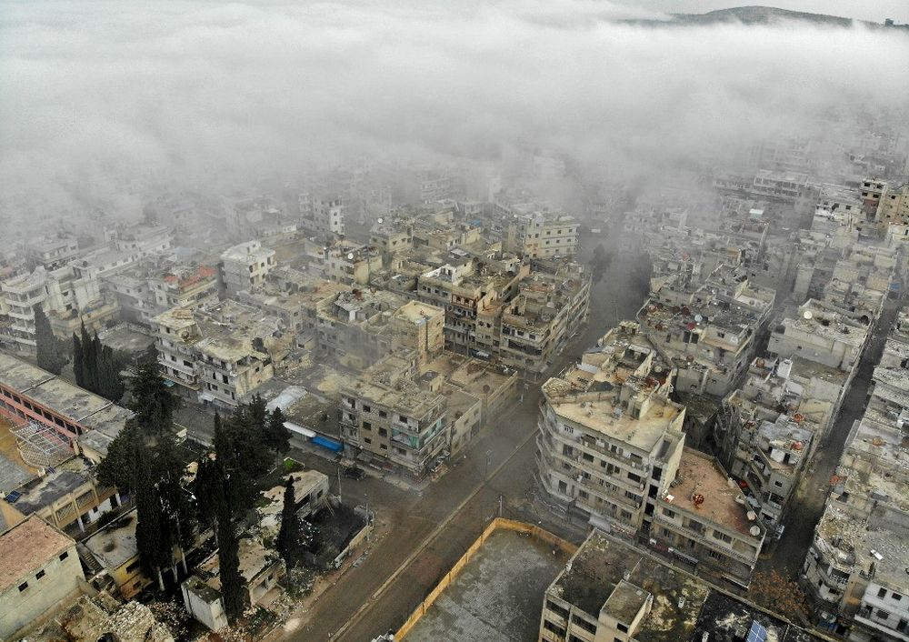 An aerial view taken on February 5, 2020, shows the rebel-held town of Ariha in the northern countryside of Syriau00e2u20acu2122s Idlib province following an air strike by pro-regime forces. u00e2u20acu201d AFP pic