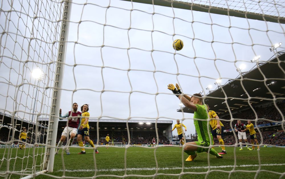 Burnley's Jay Rodriguez shoots against the crossbar as Arsenal's Bernd Leno attempts to save. u00e2u20acu201d Reuters pic