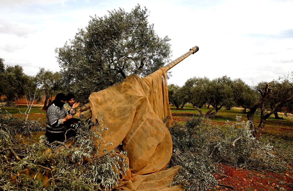 Syrian fighters set a target to an artillery near Idlib, Syria February 27, 2020. u00e2u20acu201d Reuters pic
