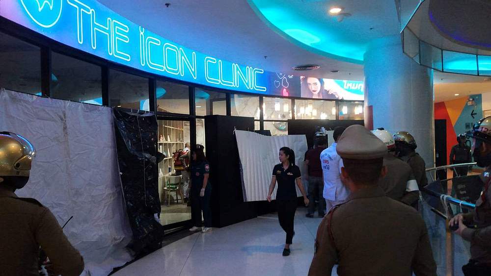 Emergency services are seen in front of a cosmetic clinic after a shooting at a shopping mall in Bangkok, Thailand February 18, 2020. u00e2u20acu201d RD.CBHK079 handout via Reuters 