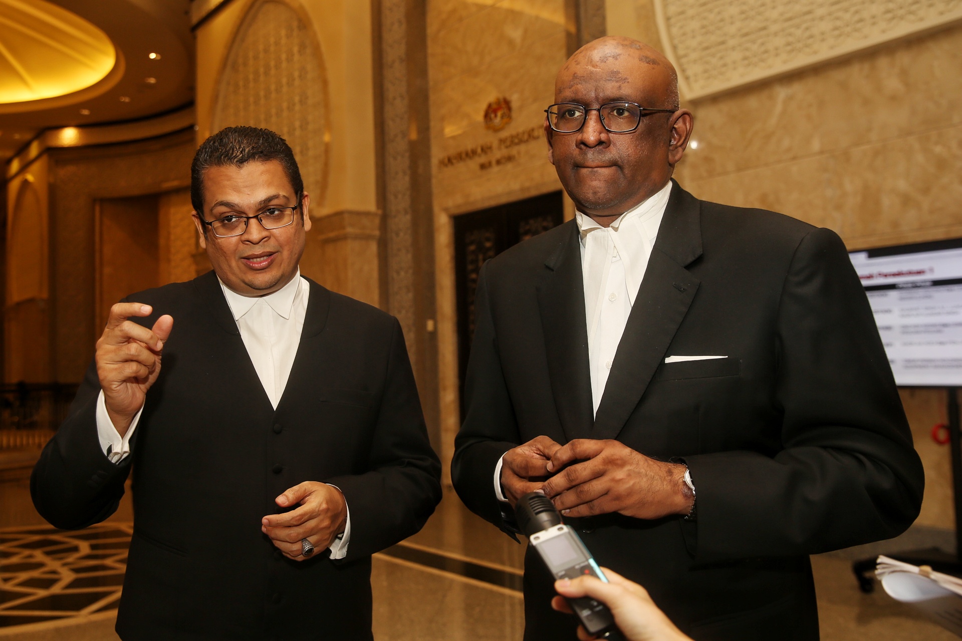 Lawyers Nizam Bashir (left) and K. Shanmuga speak to reporters at the Federal Court in Putrajaya February 13, 2020. u00e2u20acu2022 Picture by Choo Choy May nn