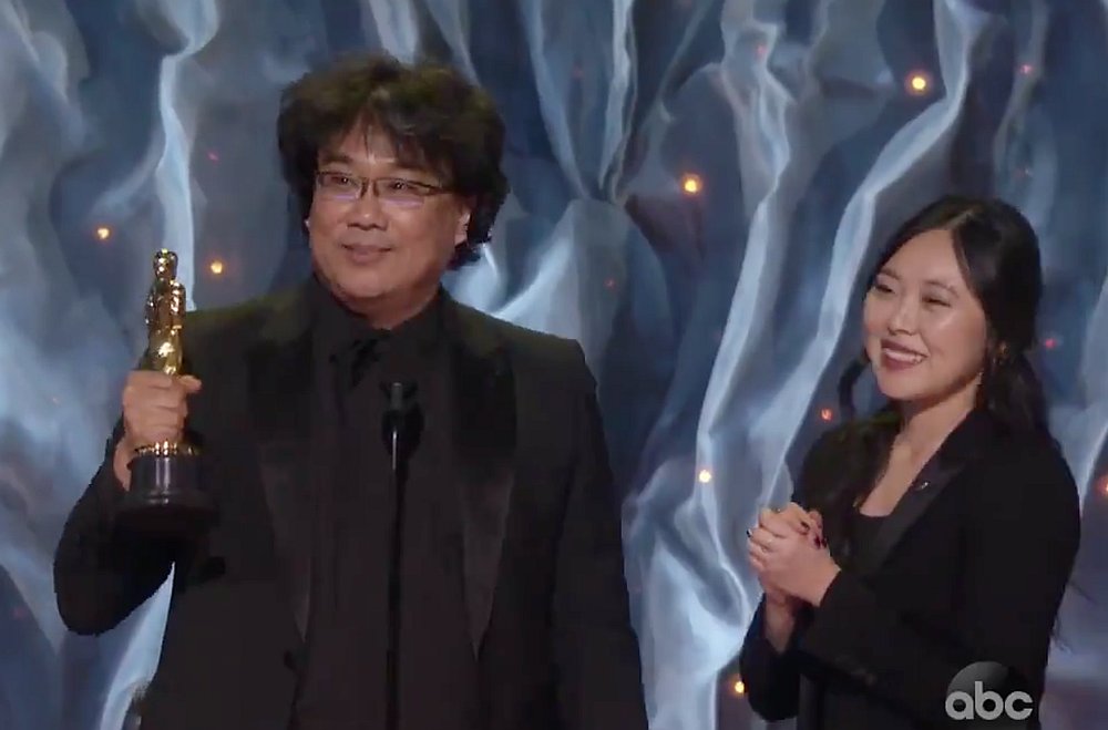Bong Joon-ho (left) and Sharon Choi onstage at the 92nd Academy Awards in Los Angeles February 9, 2020. u00e2u20acu201d Screengrab from Twitter/TheAcademy