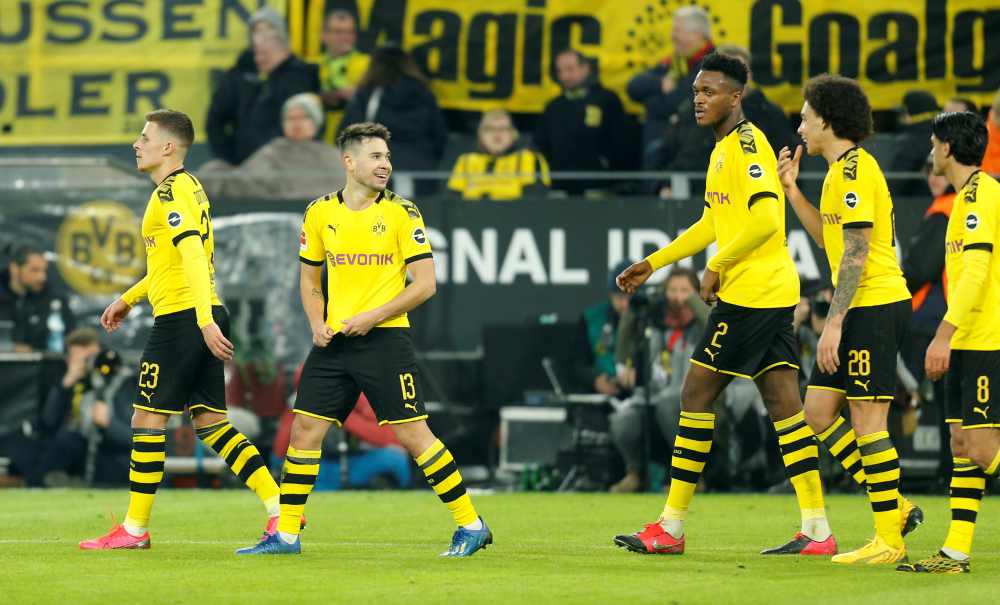 Borussia Dortmund's Raphael Guerreiro celebrates with teammates after scoring the fourth goal against Eintracht Frankfurt February 15, 2020. u00e2u20acu2022 Reuters pic