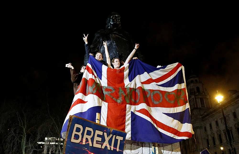 People celebrate at the statue of Winston Churchill as Britain leaves the EU on Brexit day in London January 31, 2020 u00e2u20acu201d Reuters pic