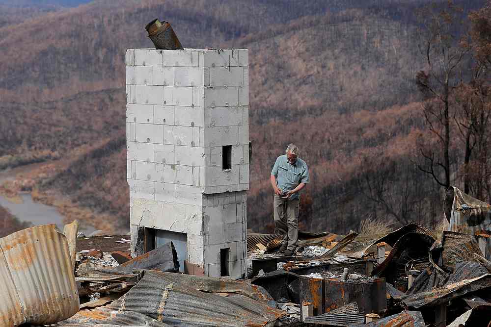 Donald Graham, 68, looks through the remains of his home which was destroyed by bushfires in Buchan, Victoria, Australia,January 23, 2020. u00e2u20acu201d Reuters pic