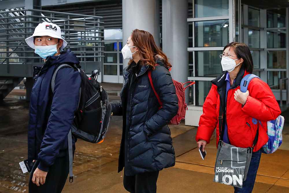Passengers wearing masks, amid the health threat of novel coronavirus, arrive on a direct flight from China at Chicago's O'Hare airport in Illinois January 24, 2020. u00e2u20acu201d Reuters pic 