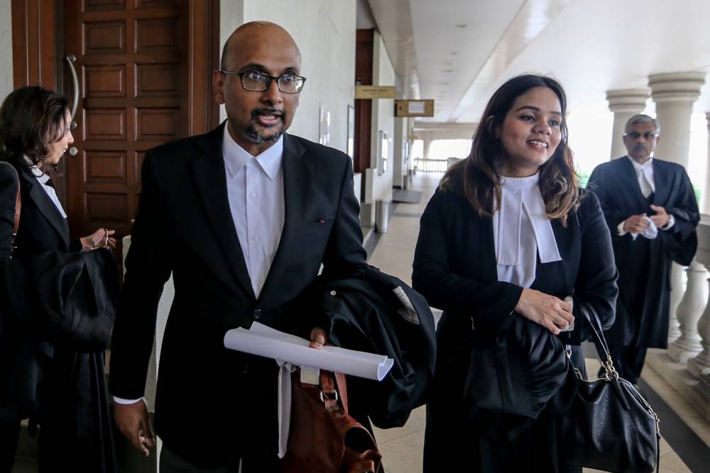 Lawyers Annou Xavier and Larissa Ann Louis are pictured at the Kuala Lumpur High Court, February 12, 2020. u00e2u20acu2022 Picture by Firdaus Latif