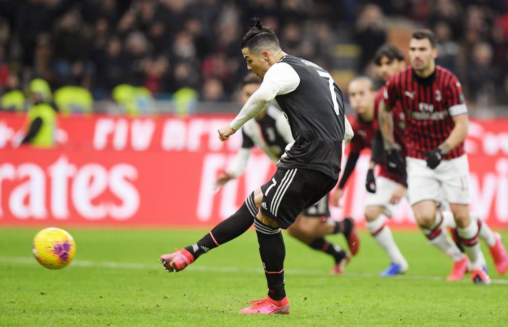 Juventus' Cristiano Ronaldo score the first goal against AC Milan from the penalty spot, February 14, 2020. u00e2u20acu2022 Reuters pic