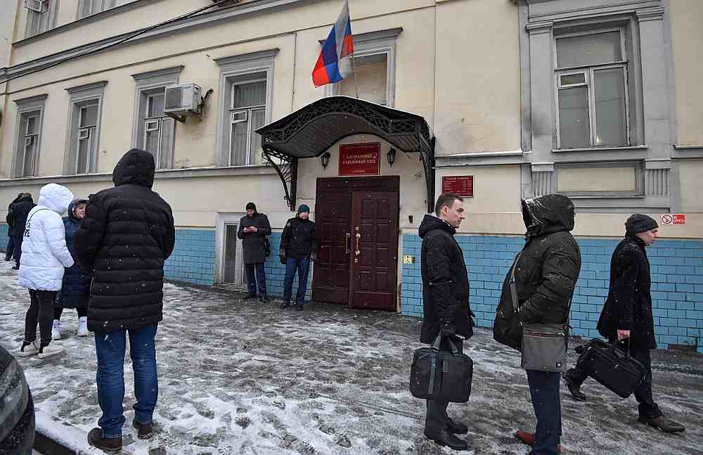 People stand outside court in Moscow on February 6, 2020. A former top official in the Russian prison service shot and killed himself in a Moscow court February 12, 2020. u00e2u20acu201d AFP pic