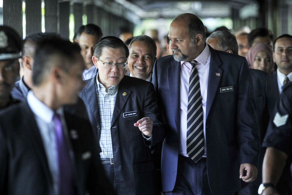 Finance Minister Lim Guan Eng and Communications Minister Gobind Singh Deo attend an MDEC and BSN SME event in Cyberjaya February 17, 2020. u00e2u20acu201d Picture by Shafwan Zaidon