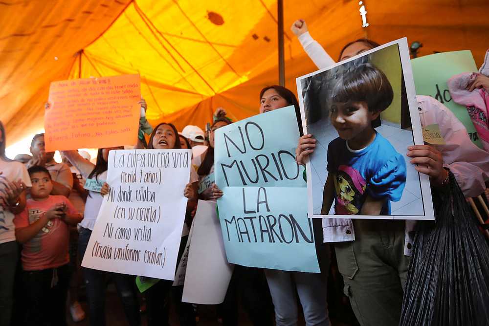Activists hold placards at the home of Fatima Cecilia Aldrighett, 7, who went missing on February 11 and whose body was discovered over the weekend inside a plastic garbage bag, in Mexico City February 17, 2020. u00e2u20acu201d Reuters pic