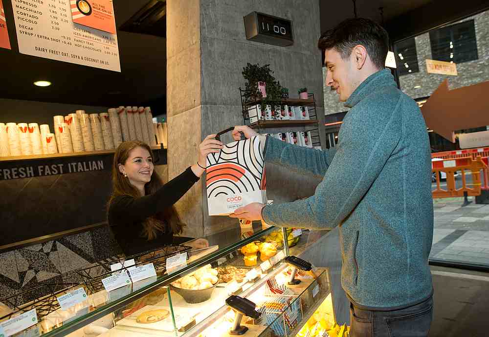 A Karma app user collects his food from a Coco Di Mama food outlet partnered with the Karma app in London January 22, 2020. u00e2u20acu201d AFP pic