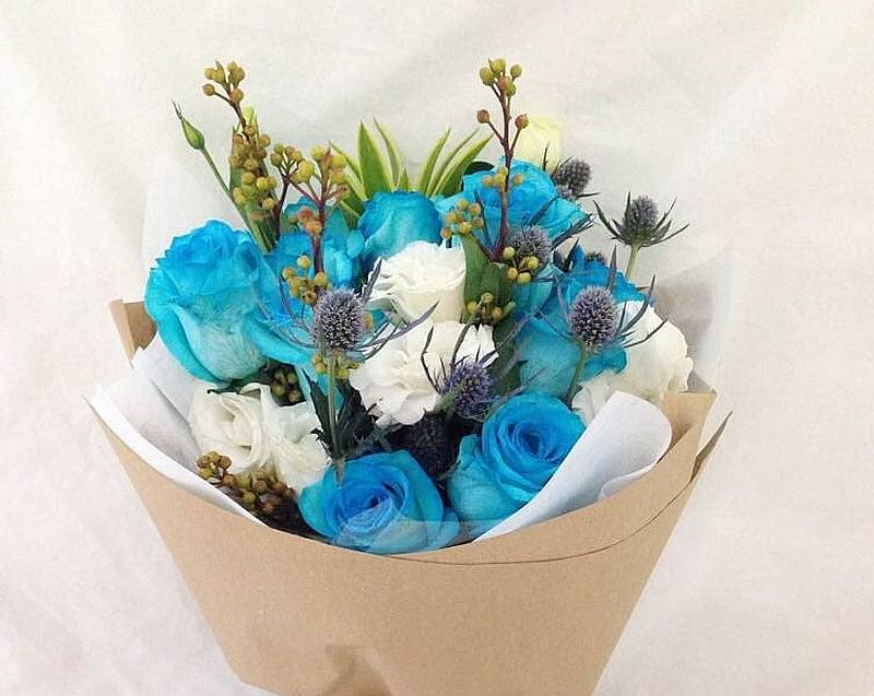 Angry customer confronts a Singapore-based florist for bad customer service and poor quality flower banquet in a heated WhatsApp conversation. u00e2u20acu201d Picture via Facebook/FloralGarageSG