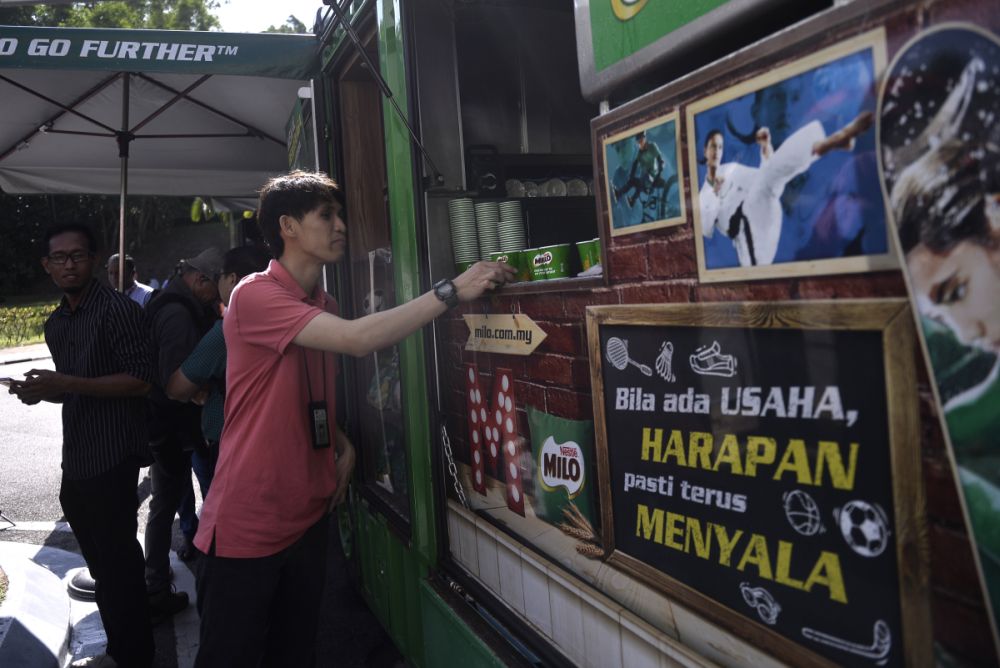 A Milo truck serves beverages to members of the media outside Istana Negara February 26, 2020. u00e2u20acu201d Picture by Miera Zulyana