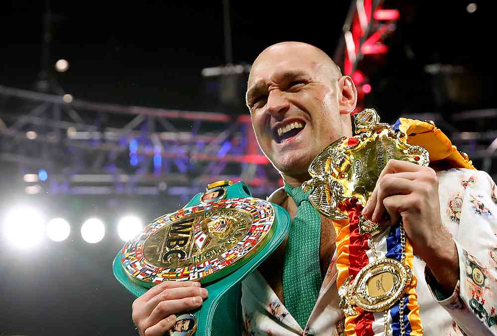 Tyson Fury poses with his belts during a press conference after the  WBC heavyweight title fight at Grand Garden Arena, Las Vegas February 22, 2020. u00e2u20acu201d Reuters pic