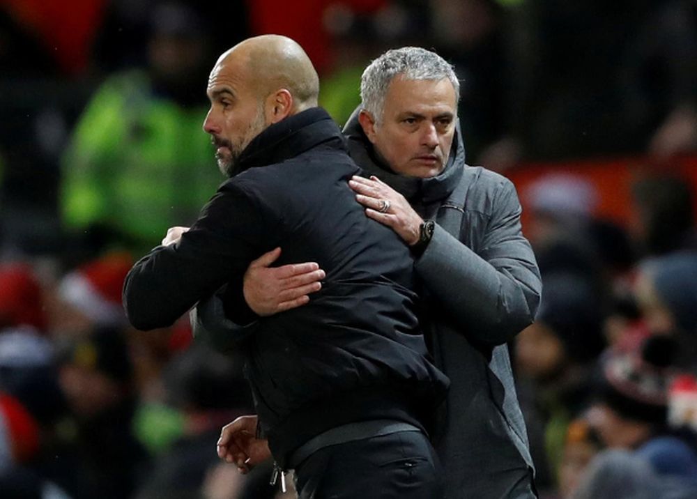 Manchester City manager Pep Guardiola and Manchester United manager Jose Mourinho at the end of the Premier League match Manchester United vs Manchester City at the Old Trafford, December 10, 2017. u00e2u20acu201d Action Images via Reuters