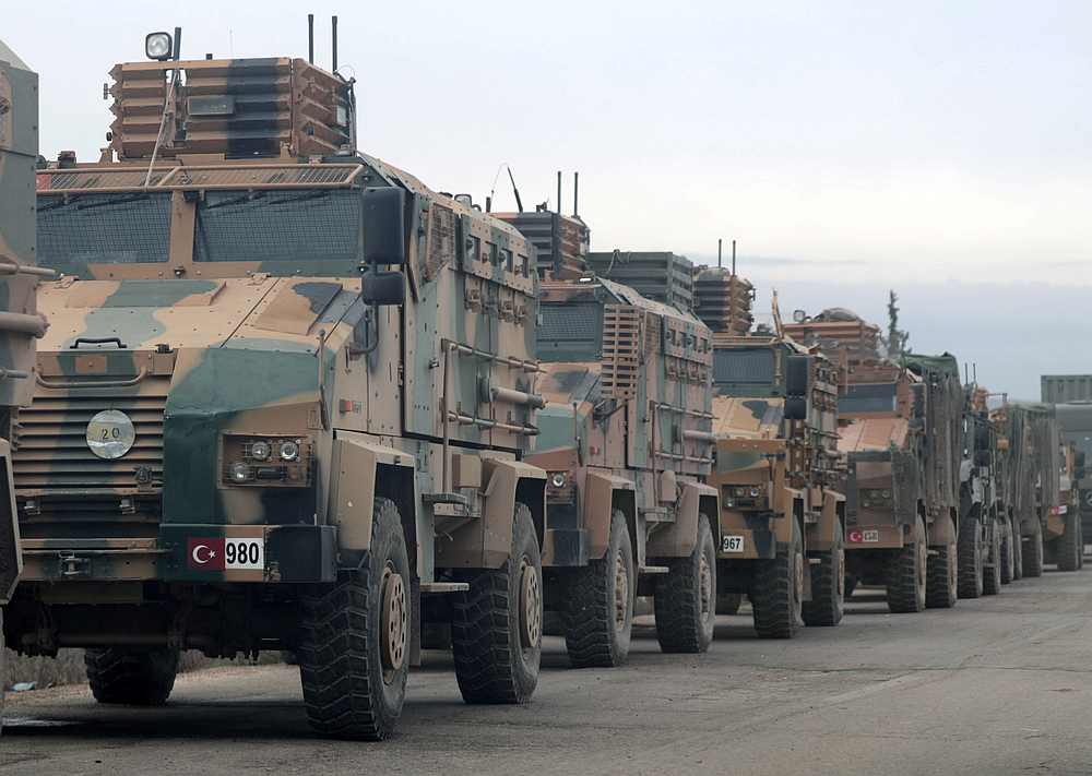 Turkish military vehicles are seen in Hazano near Idlib, Syria February 11, 2020. u00e2u20acu201d Reuters pic