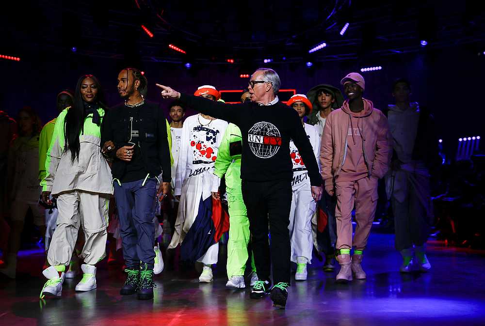 Designer Tommy Hilfiger is joined by Lewis Hamilton and models following his 'TOMMYNOW Spring 2020' show during London Fashion Week in London February 16, 2020. u00e2u20acu201d Reuters pic 